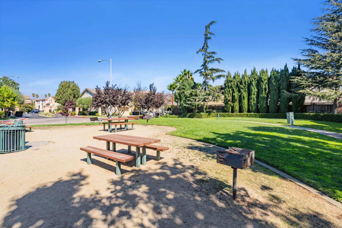 964 Cameron Circle Milpitas, CA 95035 - Photo 46 of 48 a park bench sitting in the middle of a park
