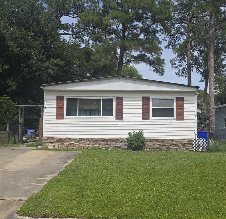 a house view with a garden space