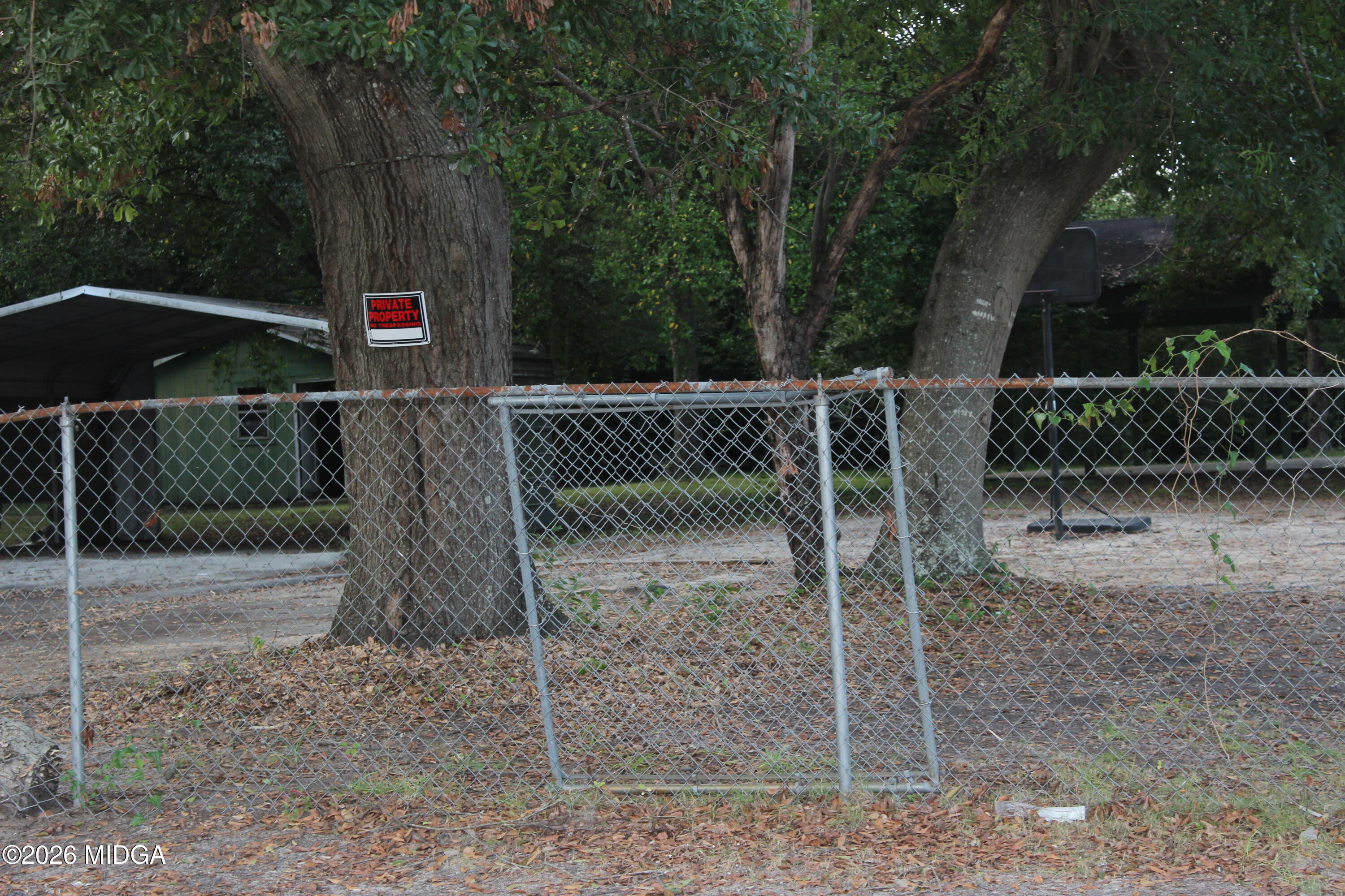 1803 Rocky Creek Road Macon, GA 31206 - Photo 13 of 13 a view of a wooden bridge