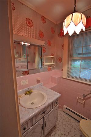 16 Overlook Road Wakefield, MA 01880 - Photo 8 of 22 a bathroom with a sink and a mirror