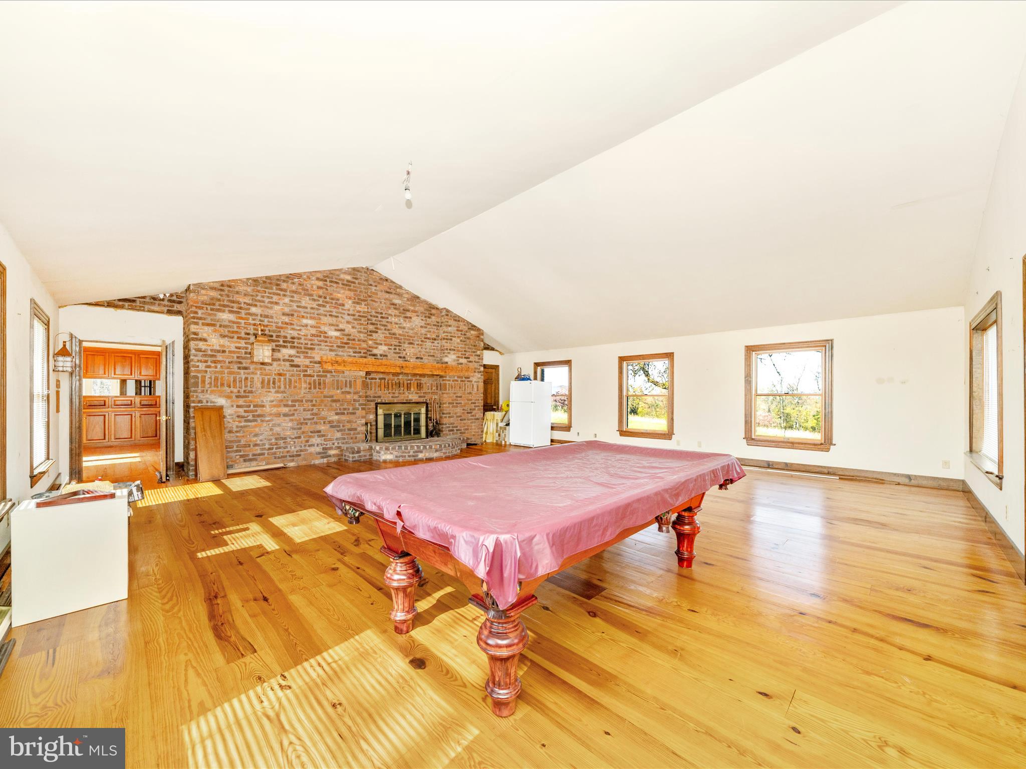 14924 Clear Spring Road Williamsport, MD 21795 - Photo 12 of 76 a spacious bedroom with a bed and wooden floor