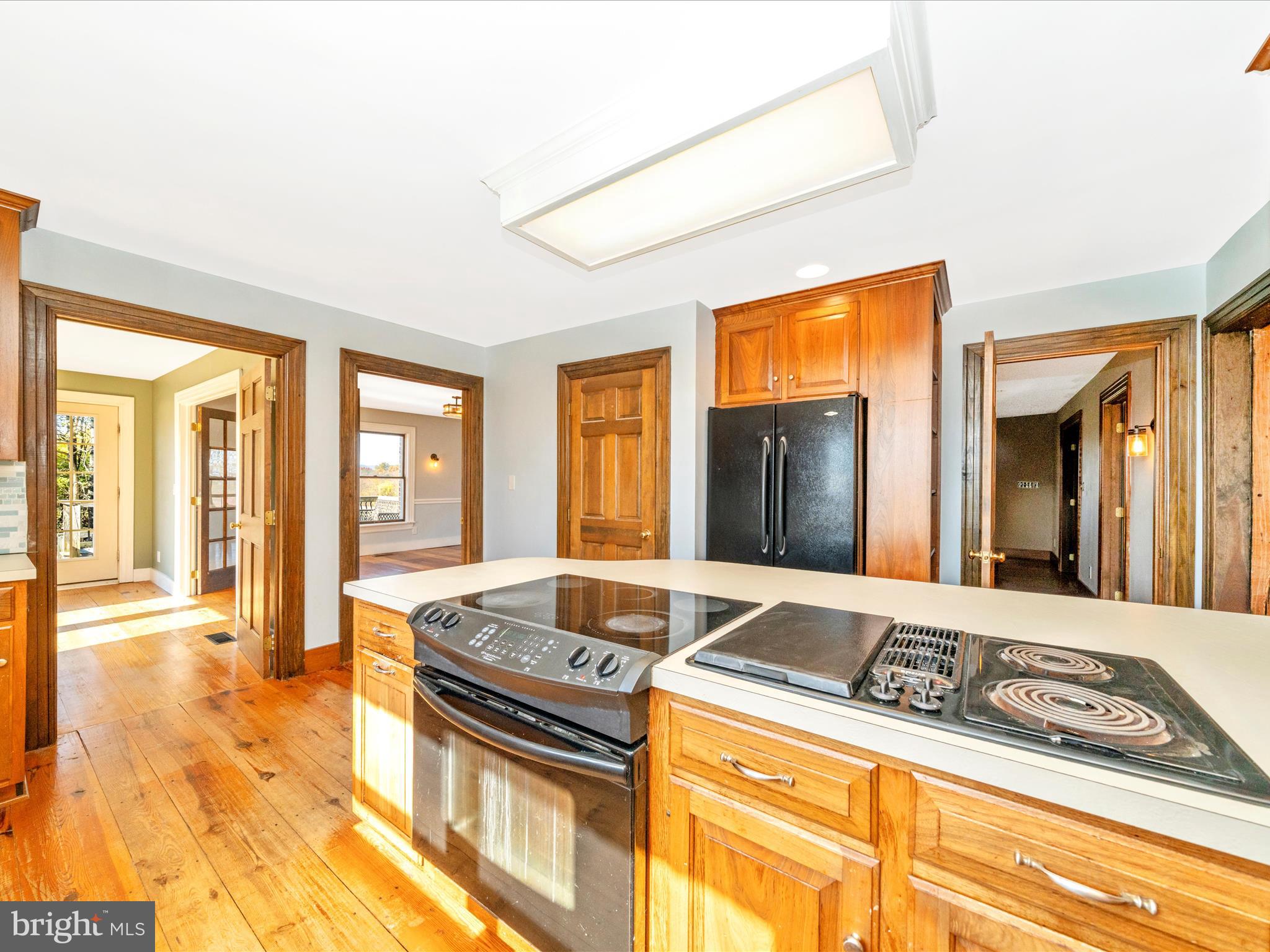 14924 Clear Spring Road Williamsport, MD 21795 - Photo 15 of 76 a living room with stainless steel appliances granite countertop a sink and cabinets