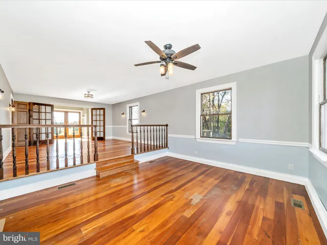 a white bath tub sitting in a bathroom