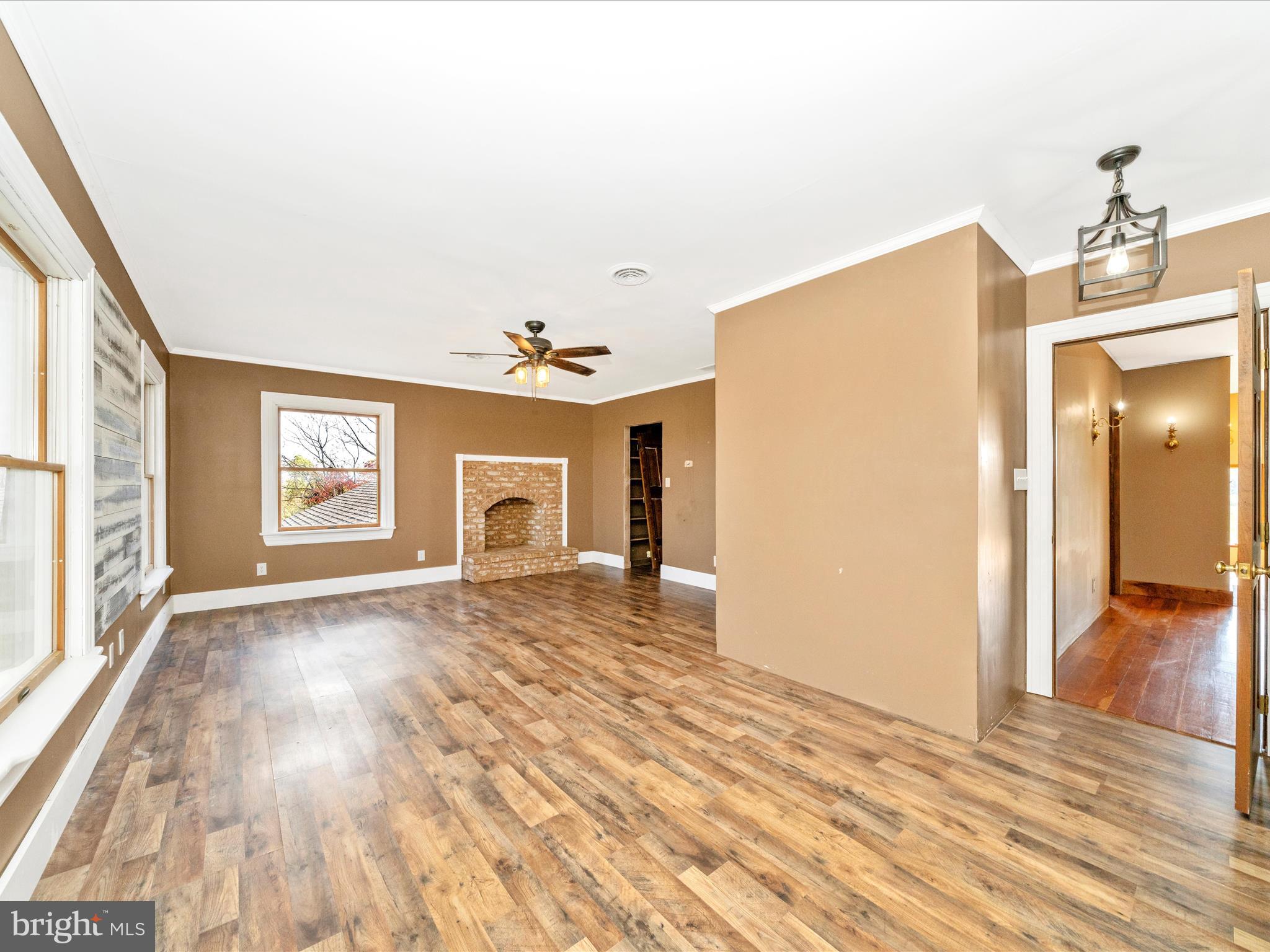 14924 Clear Spring Road Williamsport, MD 21795 - Photo 29 of 76 wooden floor in an empty room with a window