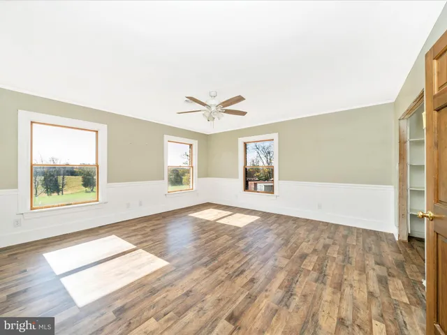 a view of a building with sitting area