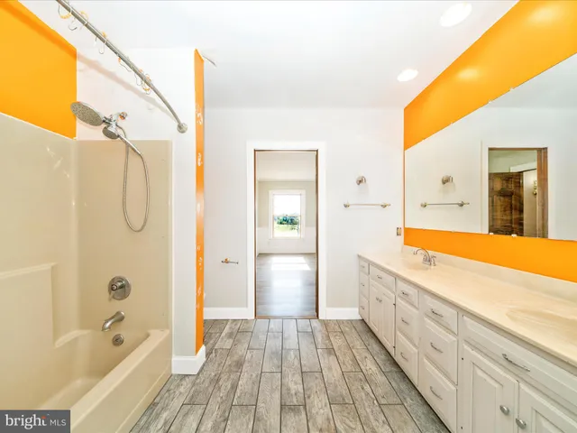 a view of a brick house with many windows