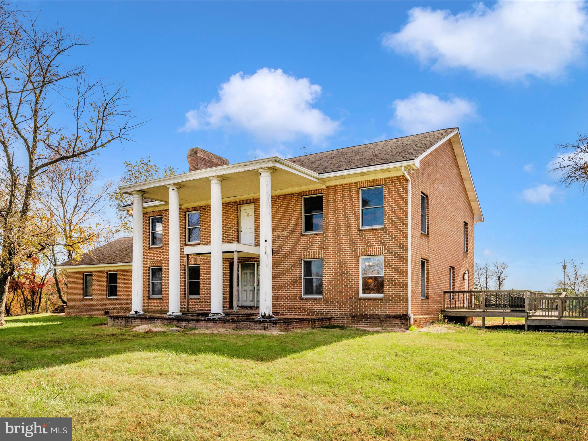 14924 Clear Spring Road Williamsport, MD 21795 - Photo 44 of 76 a view of a house with a yard and a tree