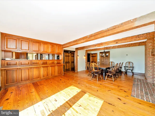 a kitchen with stainless steel appliances granite countertop a sink and a cabinets