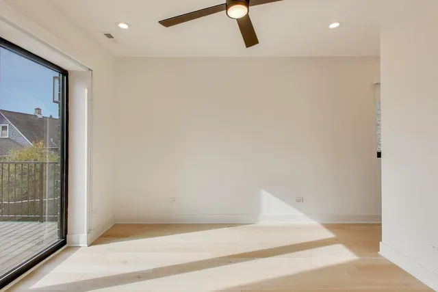 a view of a hallway with a glass door