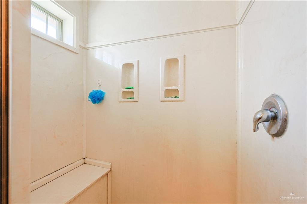 713 West 24th Place Mission, TX 78574 - Photo 19 of 36 a bathroom with a shower