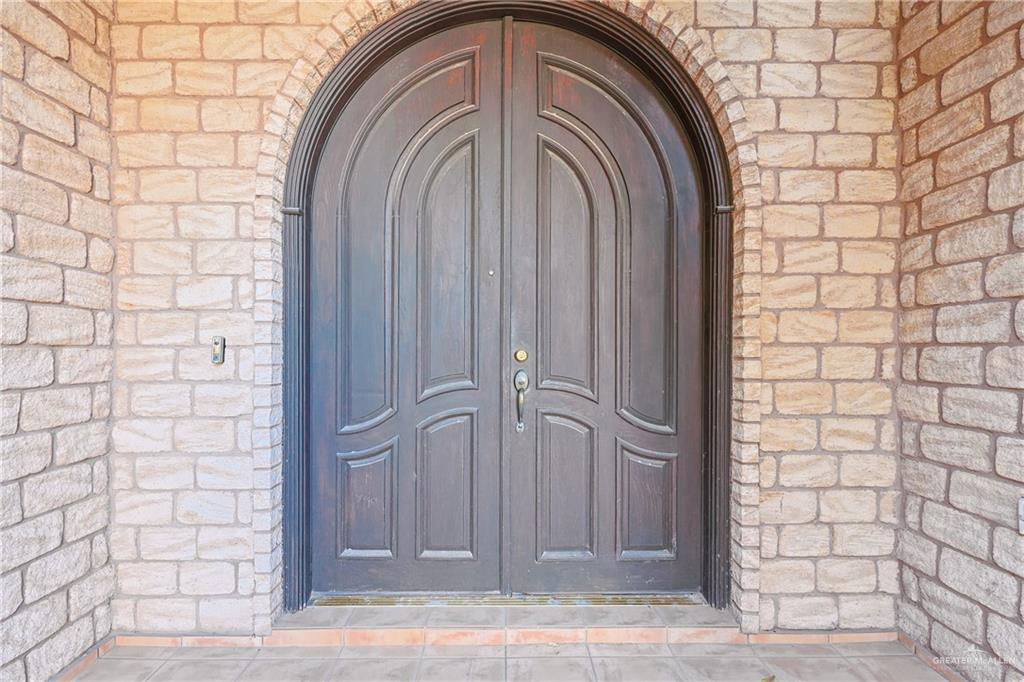 713 West 24th Place Mission, TX 78574 - Photo 3 of 36 a view of a wooden door