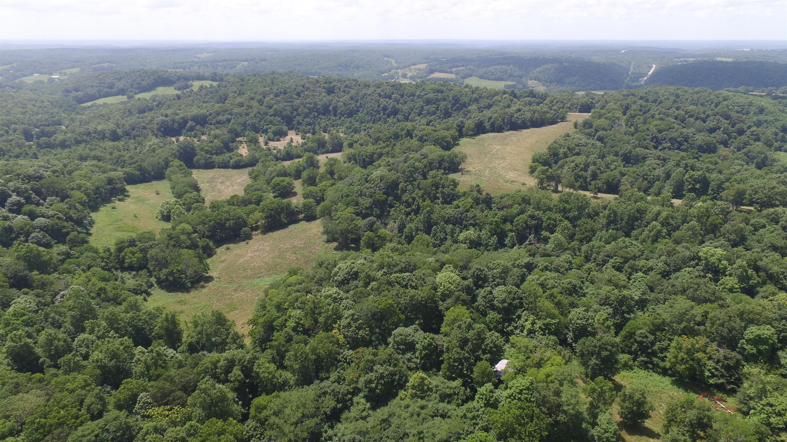 0 Raleigh-Elam Road Santa Fe, TN 38482 - Photo 13 of 17 an aerial view of town with residential houses with outdoor space and trees