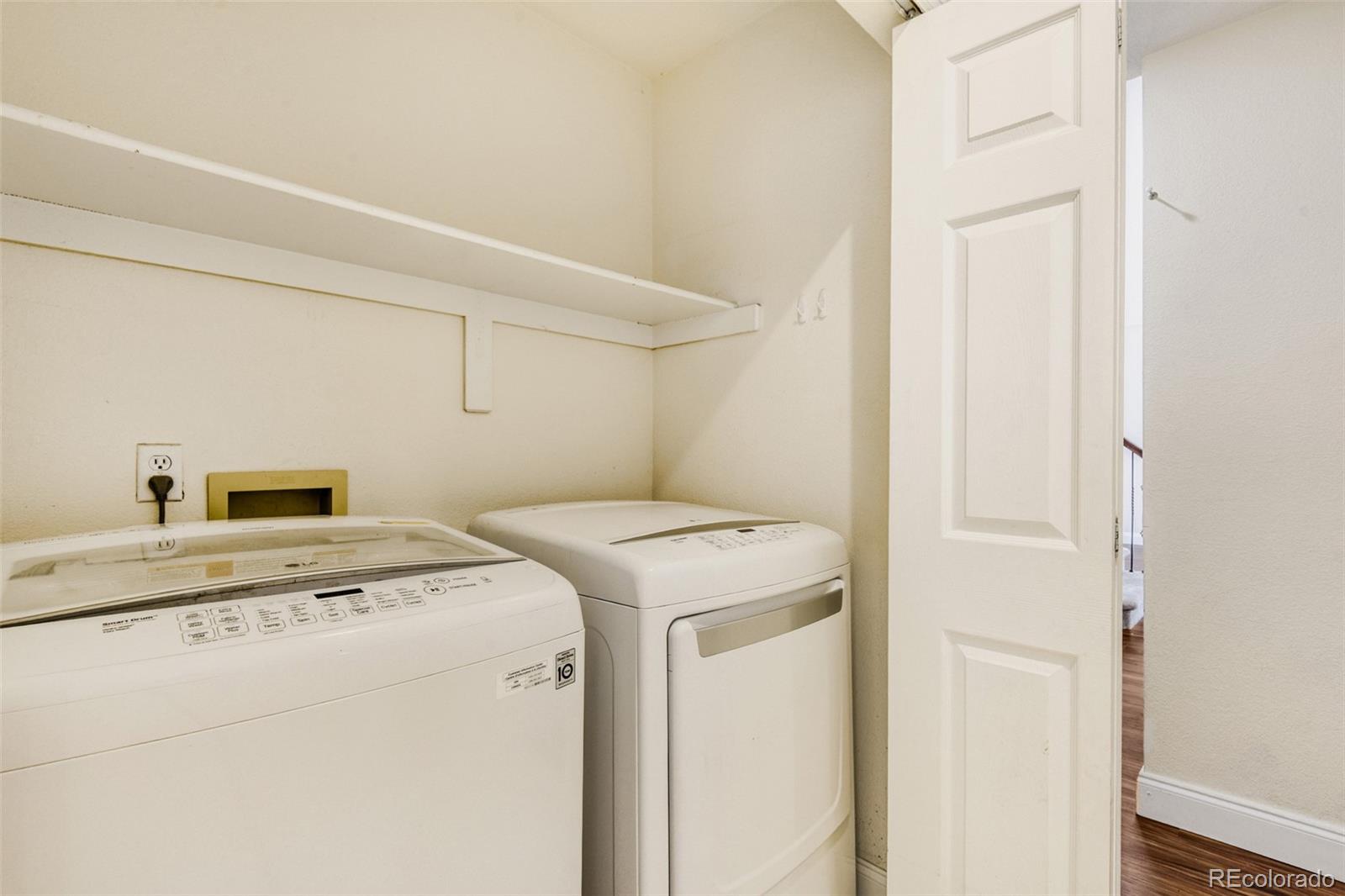 10047 Andrush Court Lone Tree, CO 80124 - Photo 20 of 37 a utility room with dryer and washer