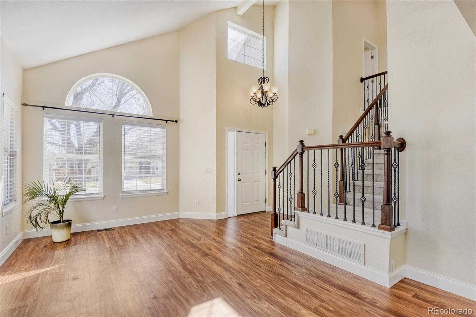 10047 Andrush Court Lone Tree, CO 80124 - Photo 5 of 37 a view of an entryway with wooden floor