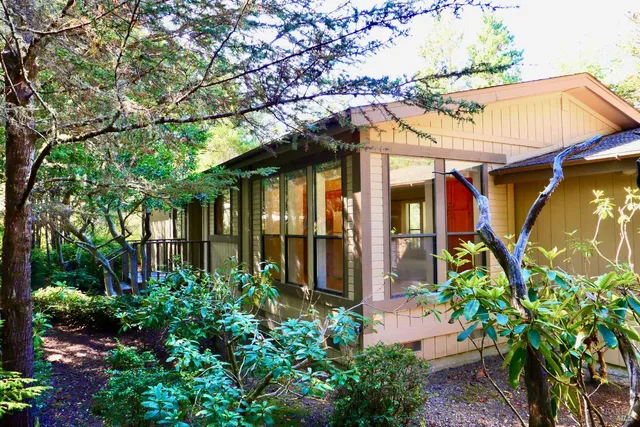a view of a pathway with a patio