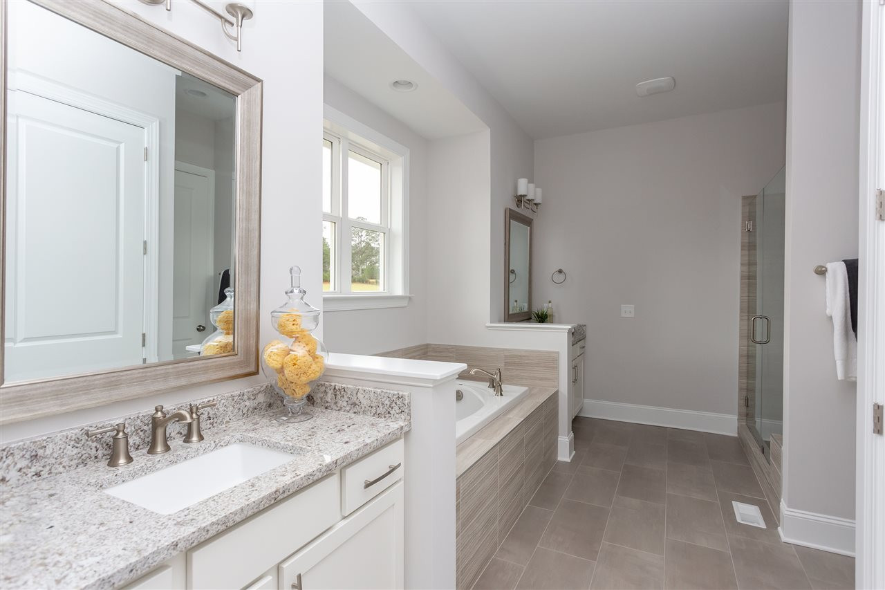5216 Stream Bank Court, Unit 19 Raleigh, NC 27603 - Photo 23 of 30 Photo is for representational purposes only - not of actual home. Owner's Bath
