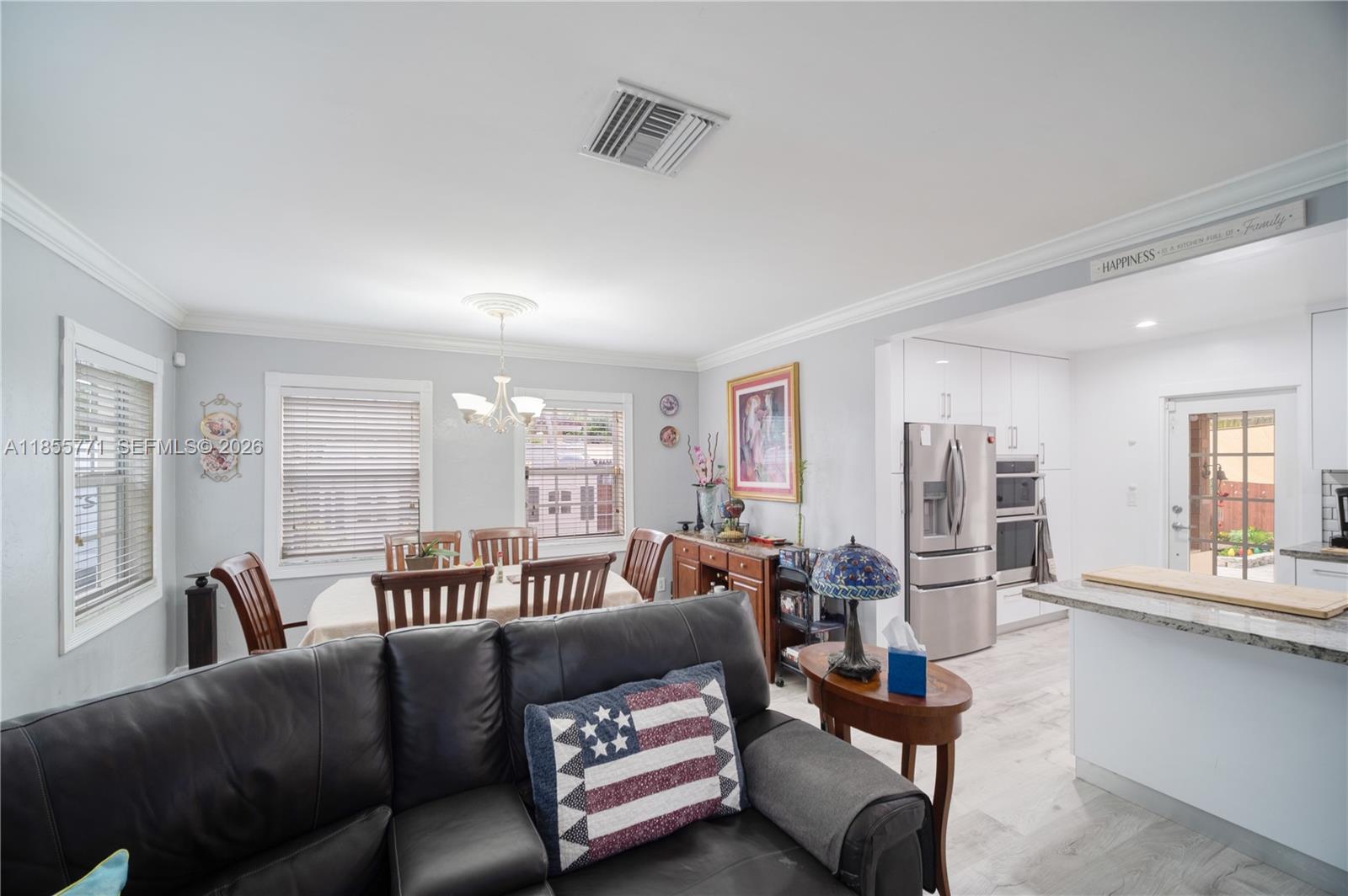 3715 Southwest 29th Street Miami, FL 33134 - Photo 2 of 16 Photo of the living room and dining room combination, open layout 3715 SW 29th St.