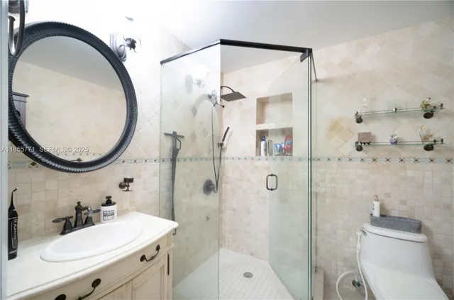 a bathroom with a sink and a white curtain