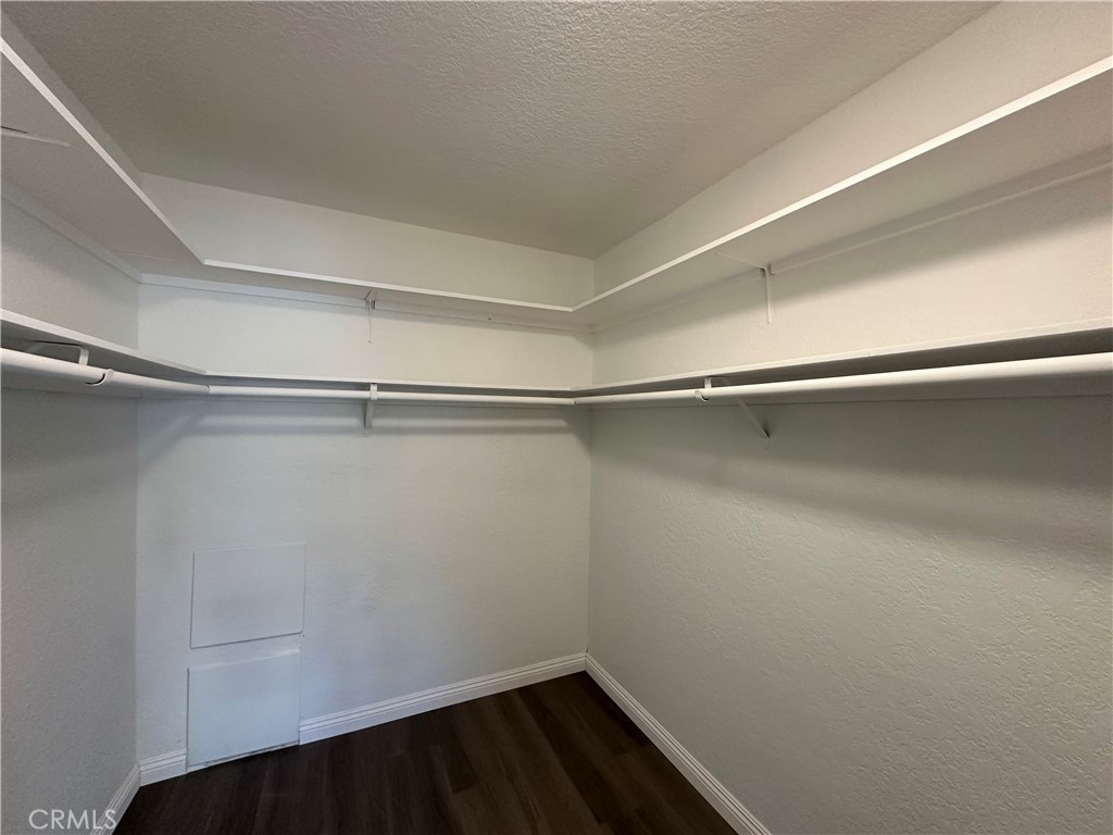 2386 East Del Mar Boulevard, Unit 203 Pasadena, CA 91107 - Photo 18 of 28 a view of a room with racks on the wall