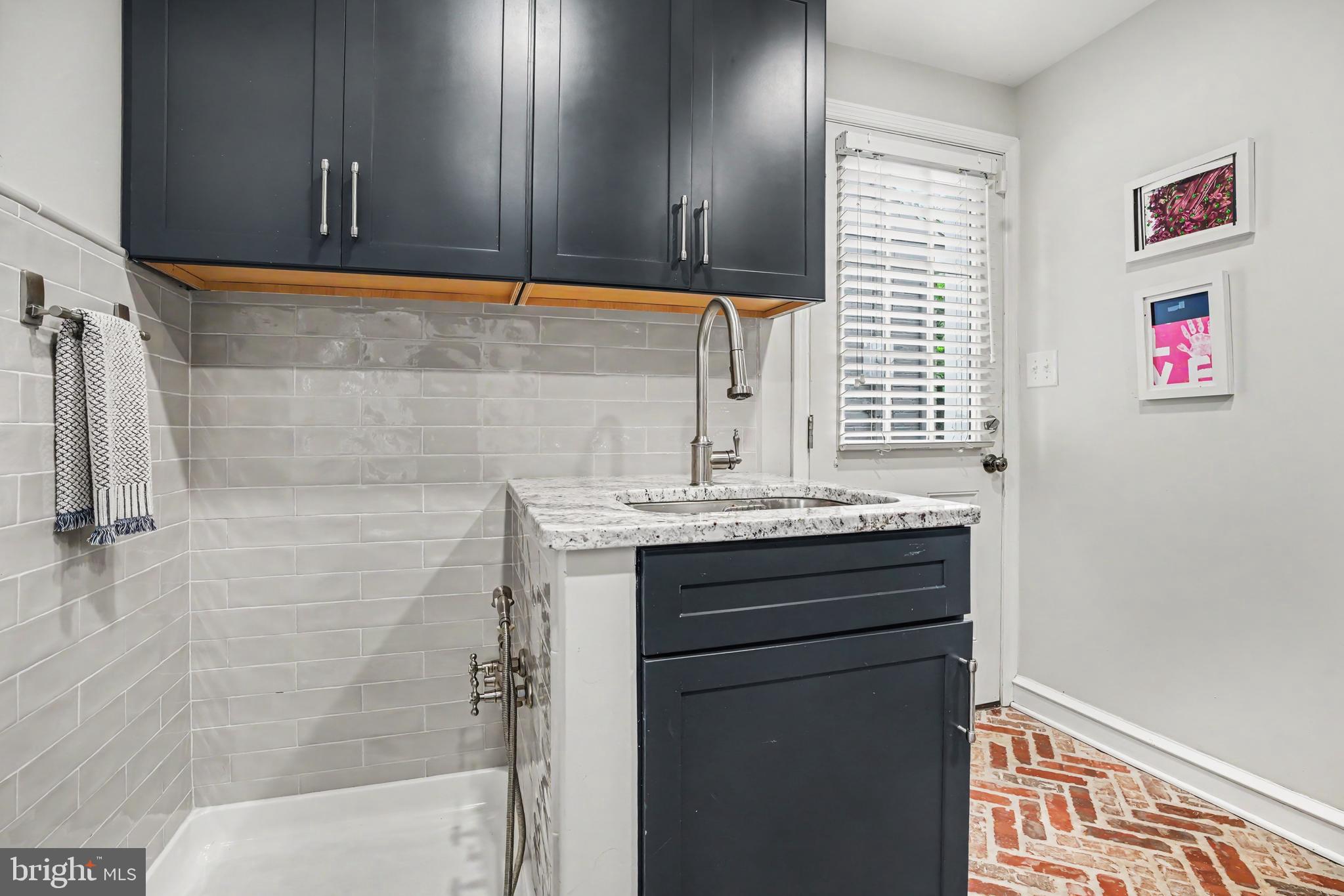 235 Hopkins Road Haddonfield, NJ 08033 - Photo 25 of 47 a bathroom with a sink and a mirror