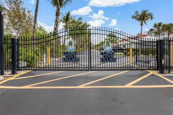 a view of a swimming pool with a patio and a garden