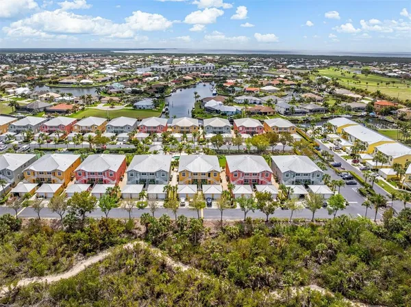 an aerial view of residential building with parking space