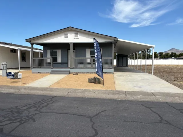 a view of a building with sitting area