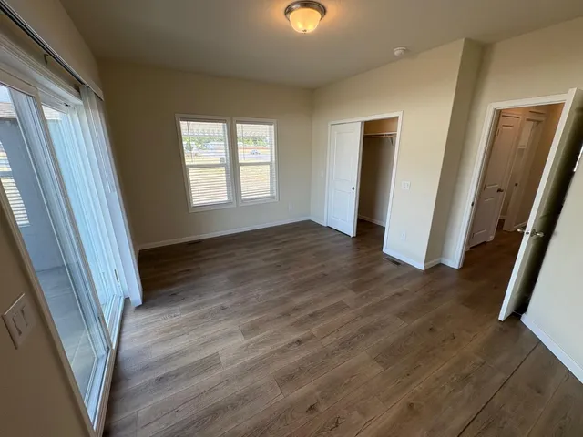 a view of livingroom with hardwood floor and window