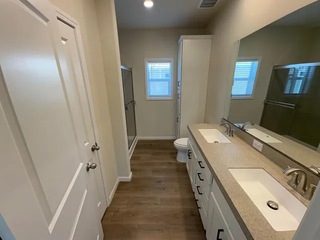 a bathroom with a sink and mirror