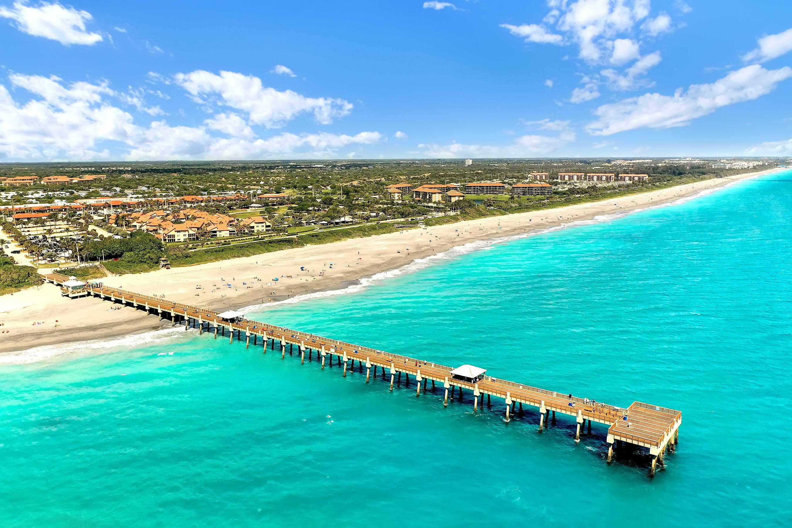2715 27th Court Jupiter, FL 33477 - Photo 1 of 22 a view of an ocean and beach