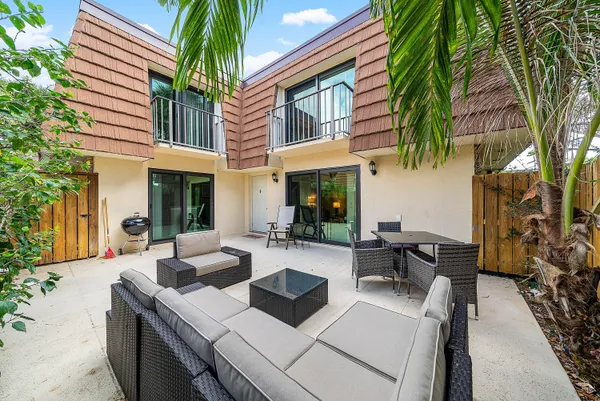 a view of pool with outdoor seating