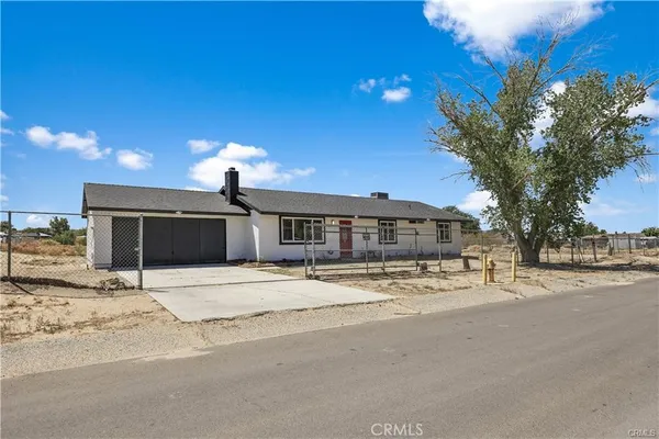 a house with yard in front of it
