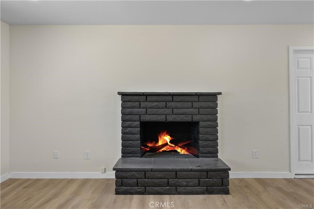 40635 159th Street East Lancaster, CA 93535 - Photo 25 of 25 a living room with a fireplace