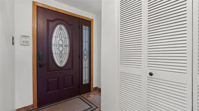 a view of a hallway with entryway