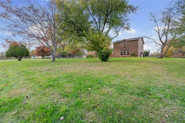 a fire hydrant in the middle of a field