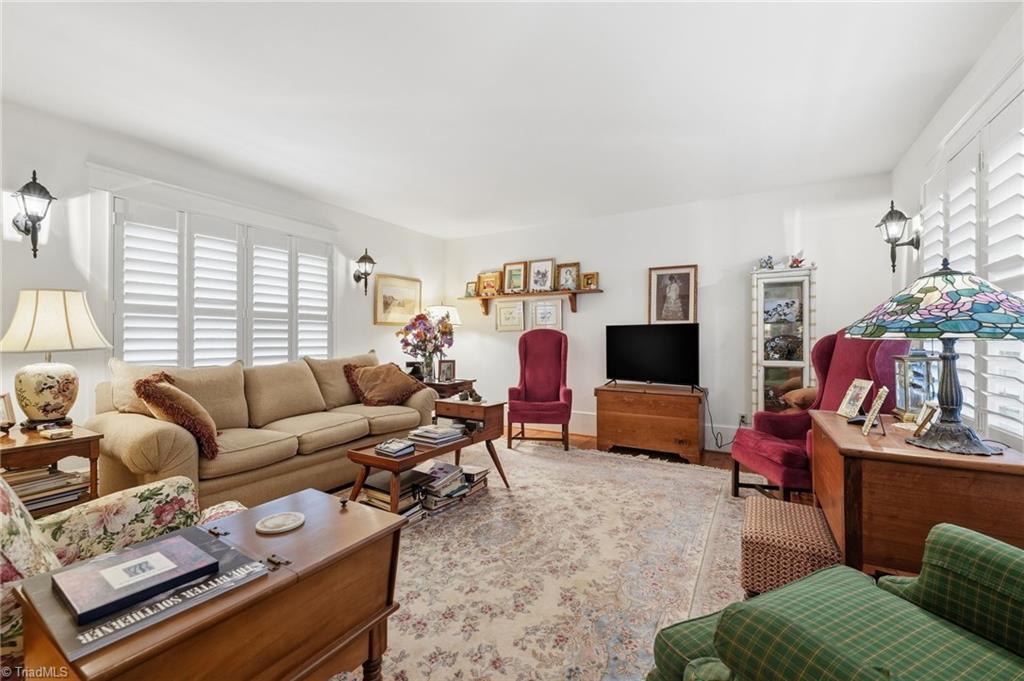 851 Case School Road Mayodan, NC 27027 - Photo 14 of 50 Cozy living room with plantation blinds