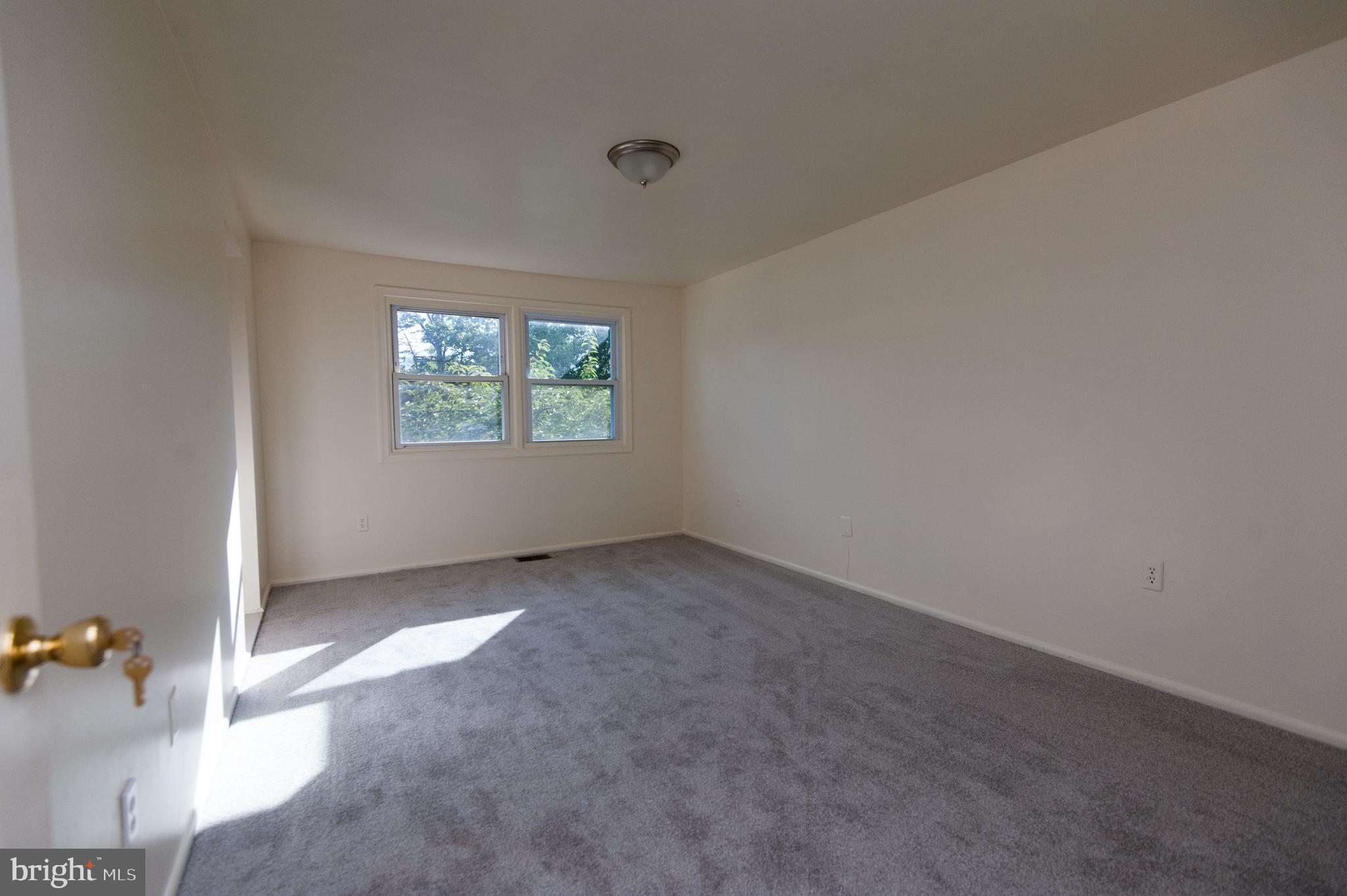 12013 Pheasant Run Drive Laurel, MD 20708 - Photo 19 of 34 an empty room with windows