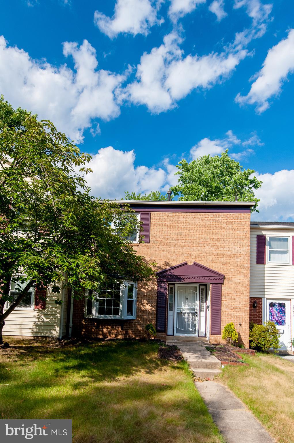 12013 Pheasant Run Drive Laurel, MD 20708 - Photo 2 of 34 a view of a house with a swimming pool