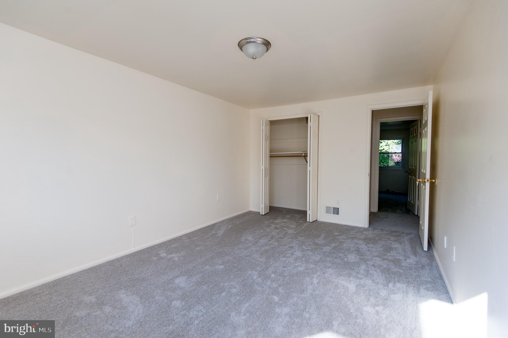 12013 Pheasant Run Drive Laurel, MD 20708 - Photo 24 of 34 an empty room with closet