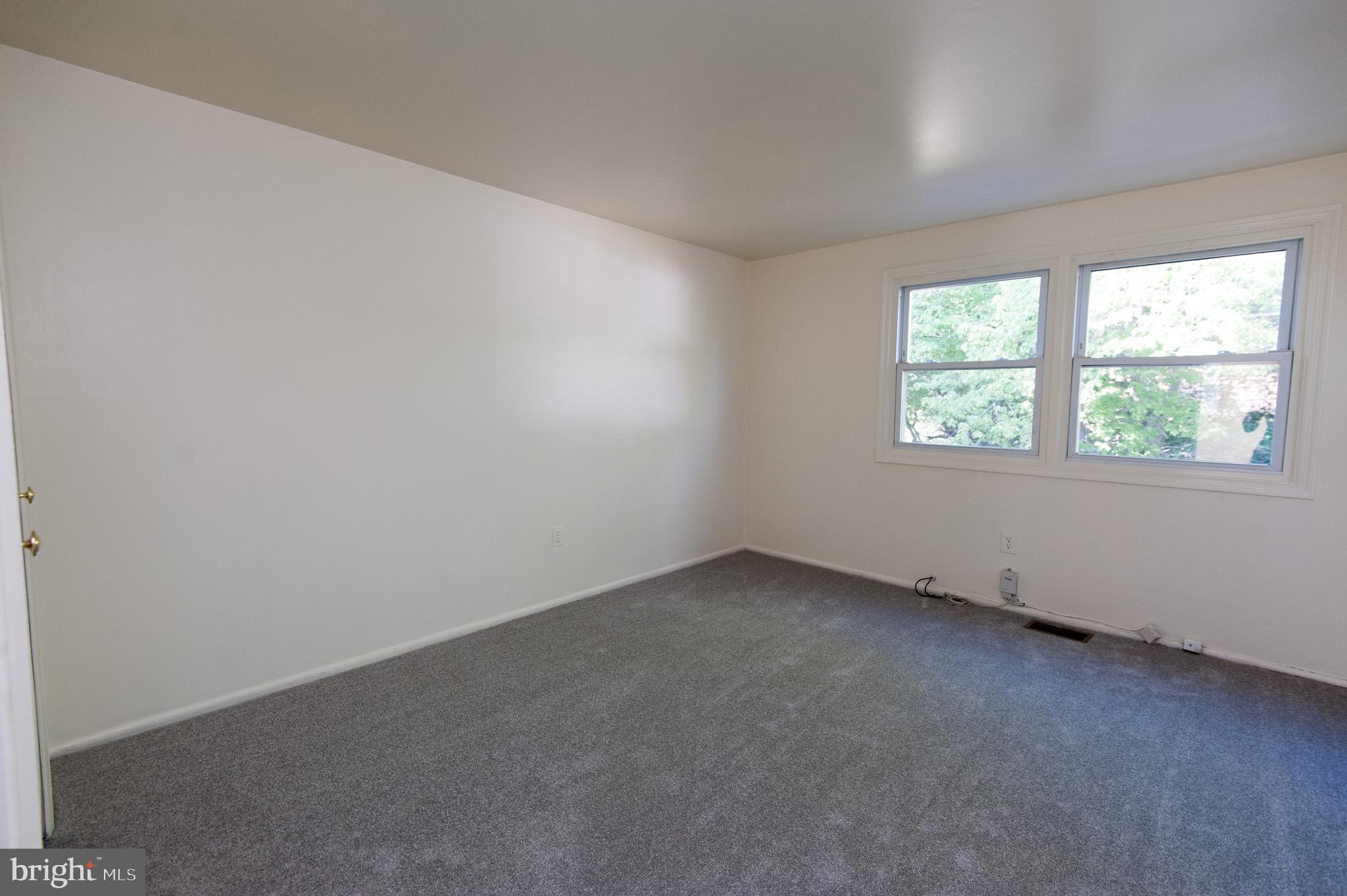 12013 Pheasant Run Drive Laurel, MD 20708 - Photo 25 of 34 an empty room with a window