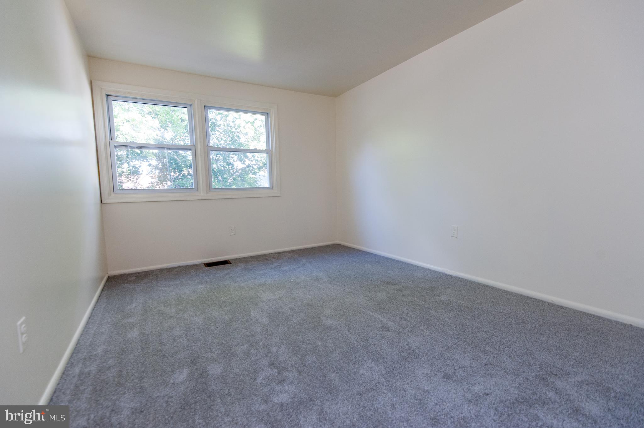 12013 Pheasant Run Drive Laurel, MD 20708 - Photo 26 of 34 an empty room with a window