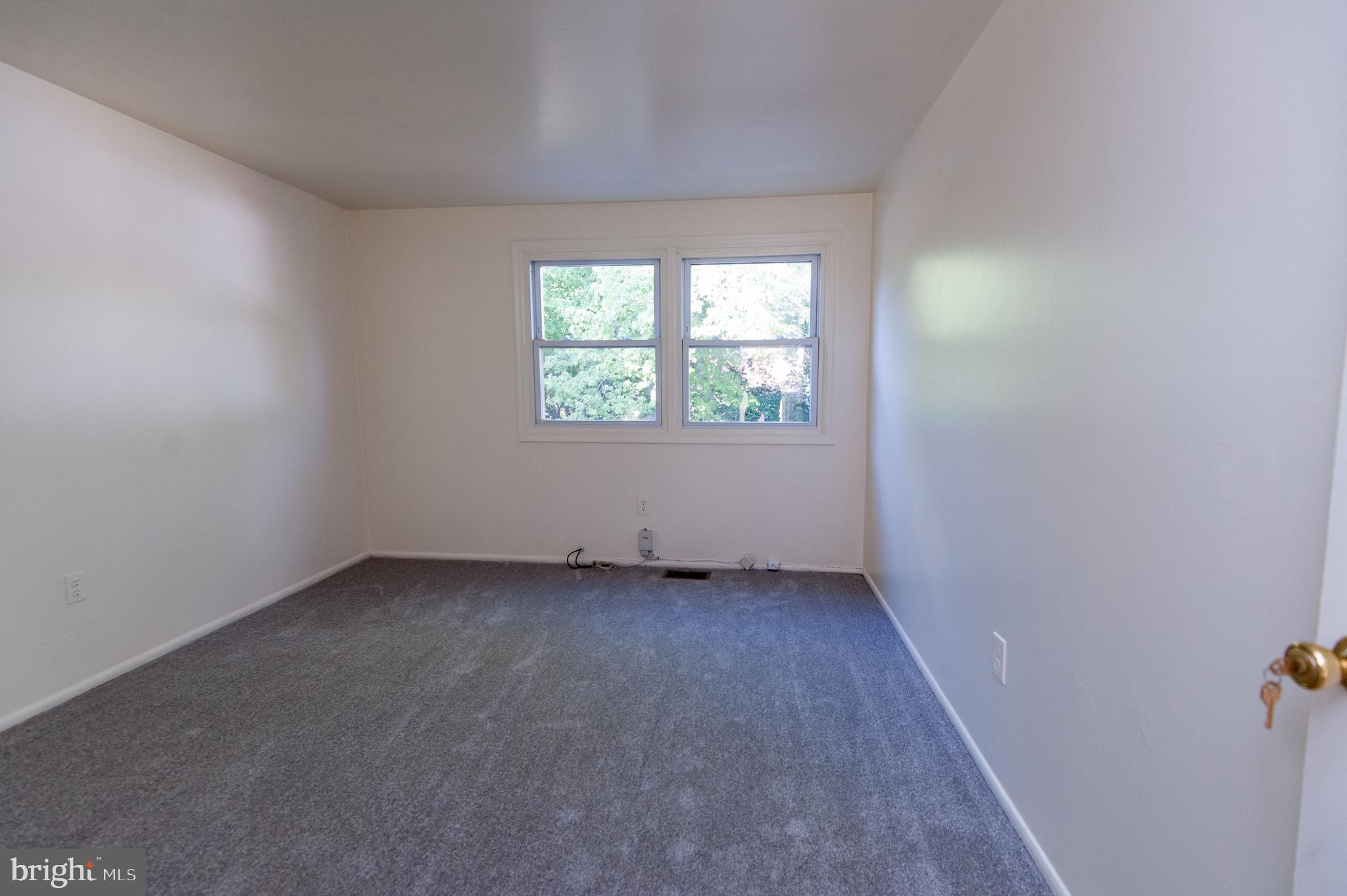 12013 Pheasant Run Drive Laurel, MD 20708 - Photo 28 of 34 an empty room with a window