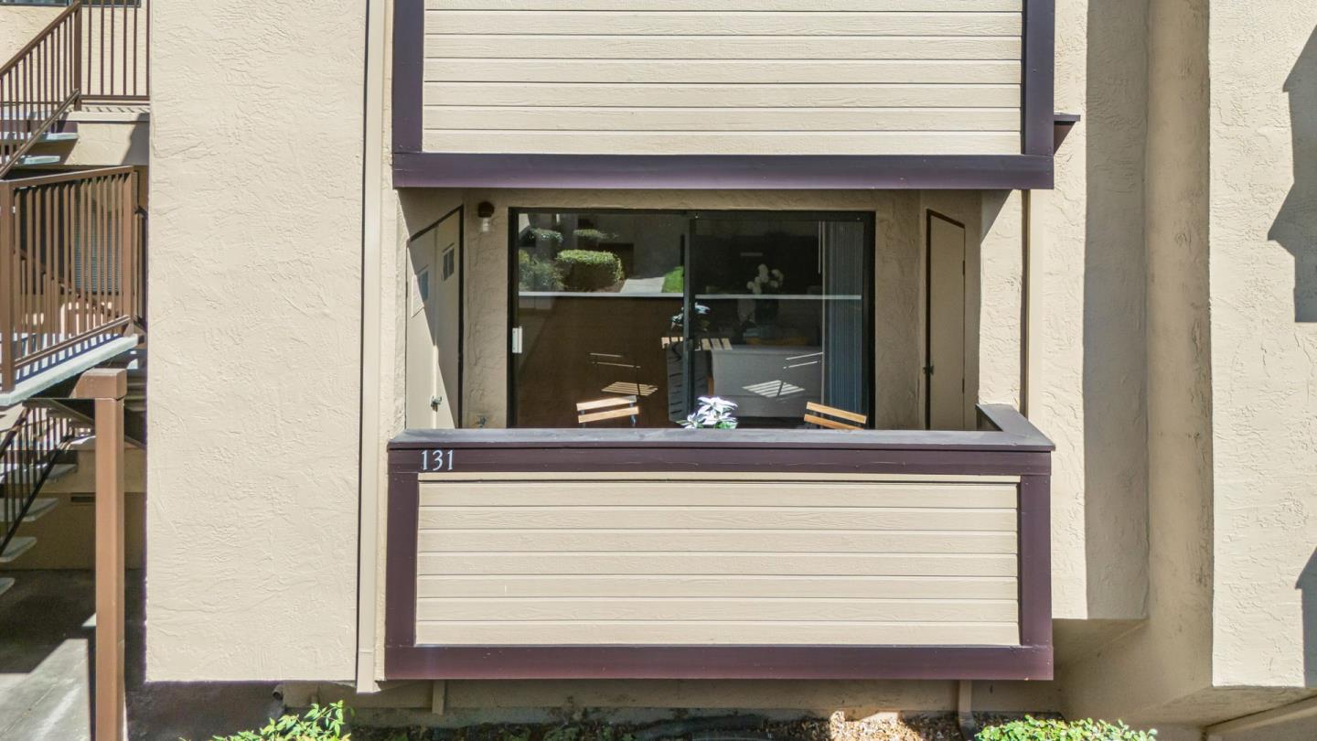 131 Wenatchee Common, Unit 14 Fremont, CA 94539 - Photo 18 of 30 a view of a wooden door and a window