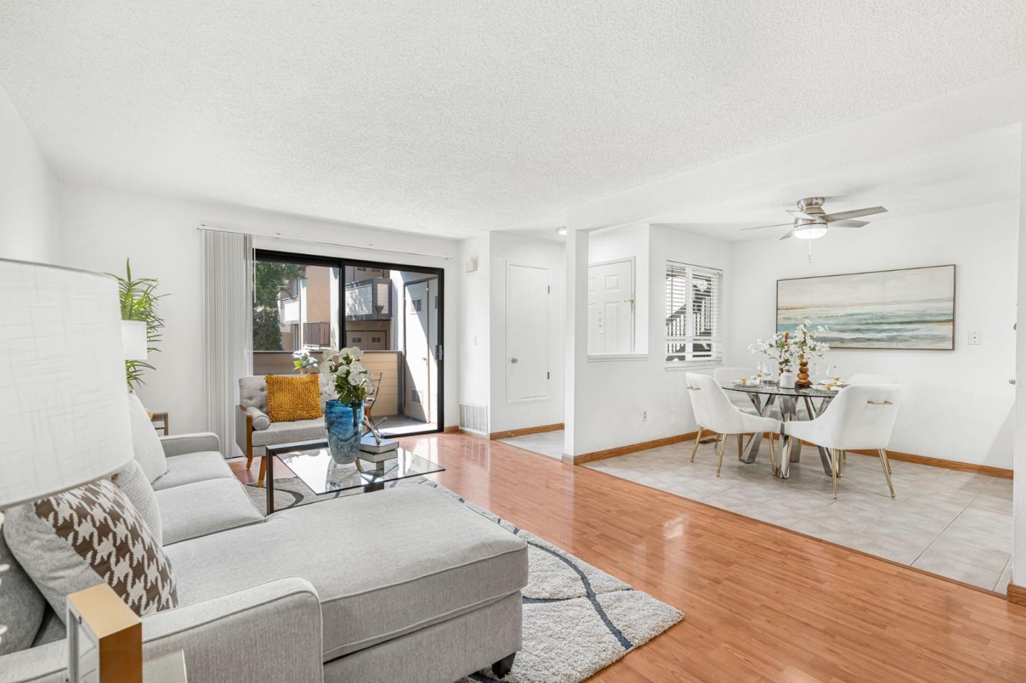 131 Wenatchee Common, Unit 14 Fremont, CA 94539 - Photo 4 of 30 a living room with furniture and wooden floor