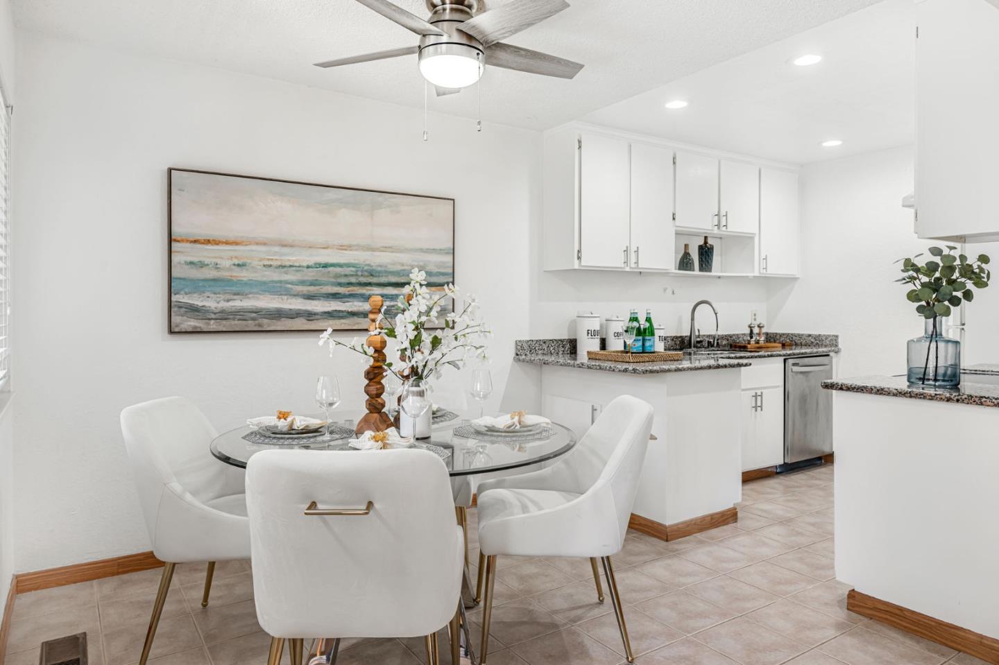 131 Wenatchee Common, Unit 14 Fremont, CA 94539 - Photo 6 of 30 a kitchen with white cabinets and white appliances