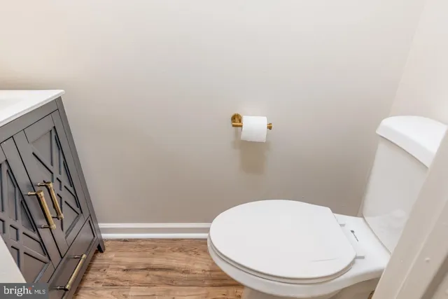 a bathroom with a toilet and a sink