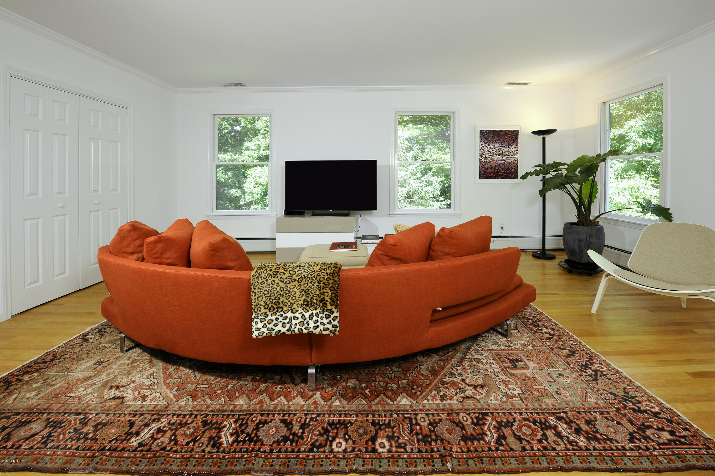 677 River Road Cos Cob, CT 06870 - Photo 13 of 23 a living room with furniture and a flat screen tv