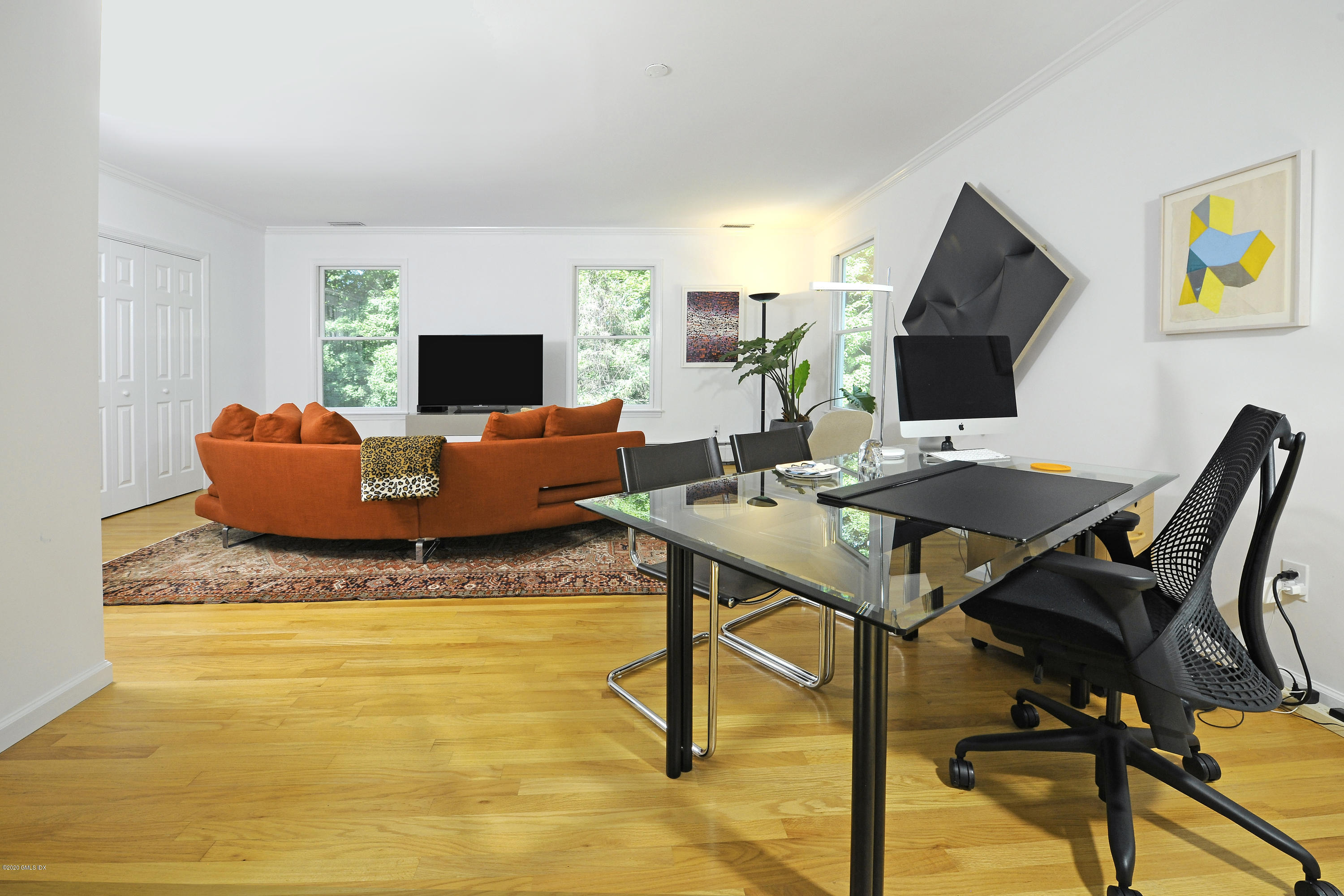 677 River Road Cos Cob, CT 06870 - Photo 14 of 23 a living room with furniture and a flat screen tv