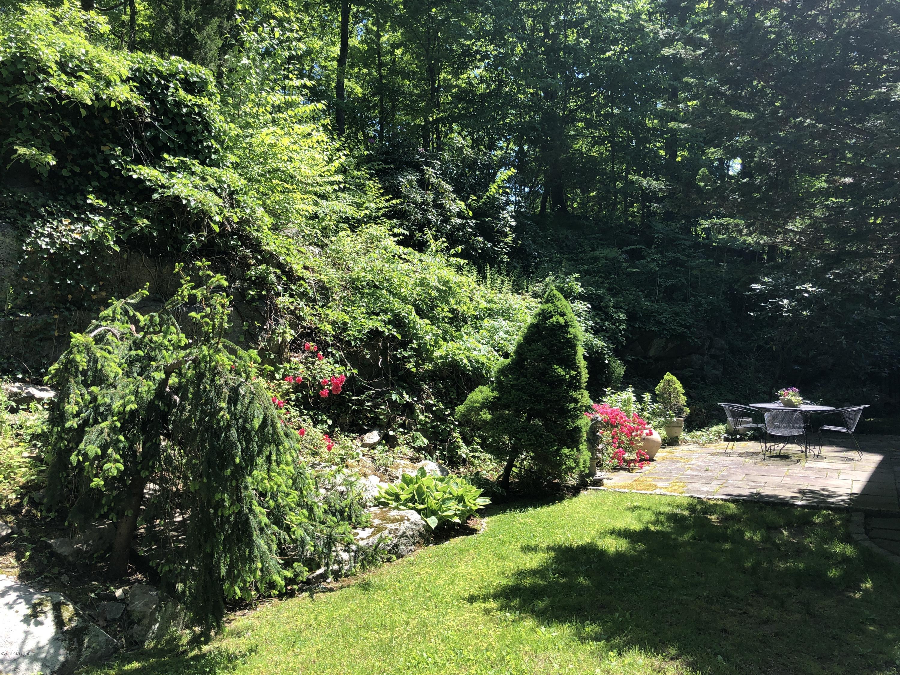 677 River Road Cos Cob, CT 06870 - Photo 23 of 23 a view of a outdoor space and a garden