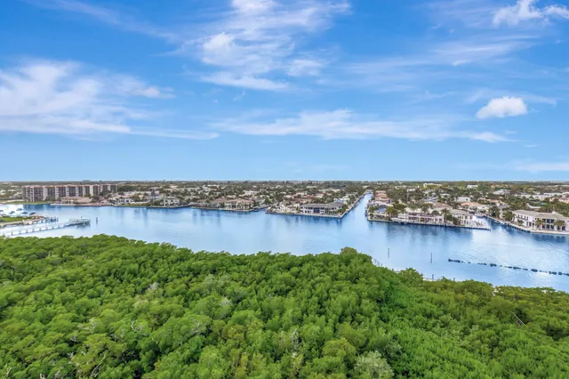 a view of a swimming pool with chairs